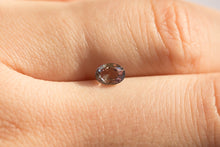 Laden Sie das Bild in den Galerie-Viewer, .64ct Loose Natural Oval Brownish Purple Sapphire
