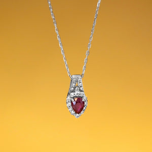 Natural Ruby with diamond pendant in Platinum