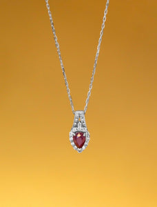 Natural Ruby with diamond pendant in Platinum